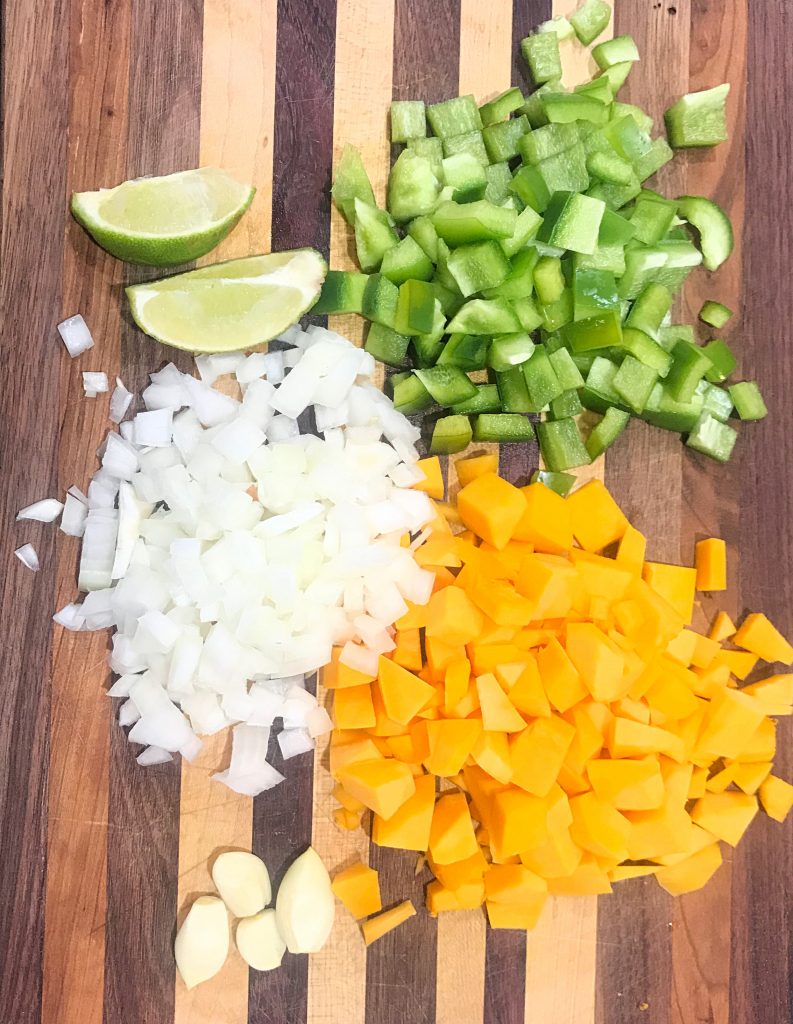Chopped veggies and sliced lime for tacos