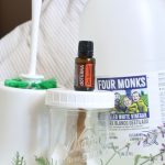 diy cleaner ingredients. Toilet brush, Baking Soday, On Guard Essential Oil, and Vinegar with Lavender sprigs